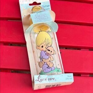 Precious Moments Baby Bottle with Yellow and Purple Design